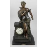 A late 19th century French spelter cased mantel clock,