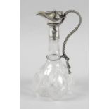 A Victorian cut glass claret jug,