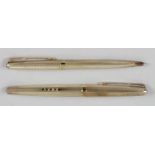 A cased 9ct gold Parker pen set,