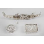 A miniature filigree model of a gondola,