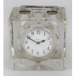 A silver mounted glass desk clock,