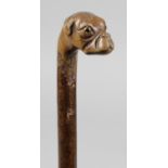 A late 19th century carved walking cane,