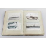 Two early 20th century post card albums,