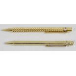 A gold plated Cartier ballpoint pen,
