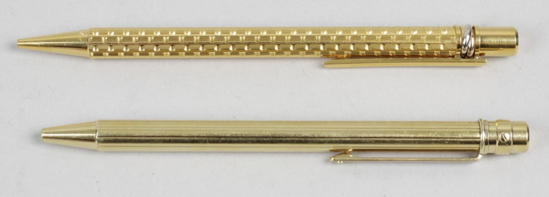 A gold plated Cartier ballpoint pen,