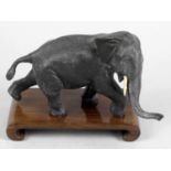 A late 19th century Japanese bronze modelled as an elephant,