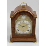 An Elliot Clock Company walnut cased bracket style mantel clock,