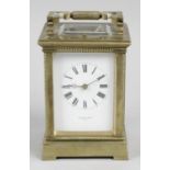 A late 19th century brass cased repeater carriage clock,