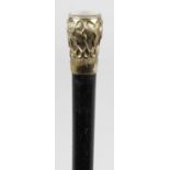 A 19th century ebonised wooden gentleman's walking cane,