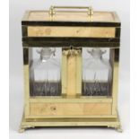 A mid 20th century brass framed and satin wood veneered tantalus,