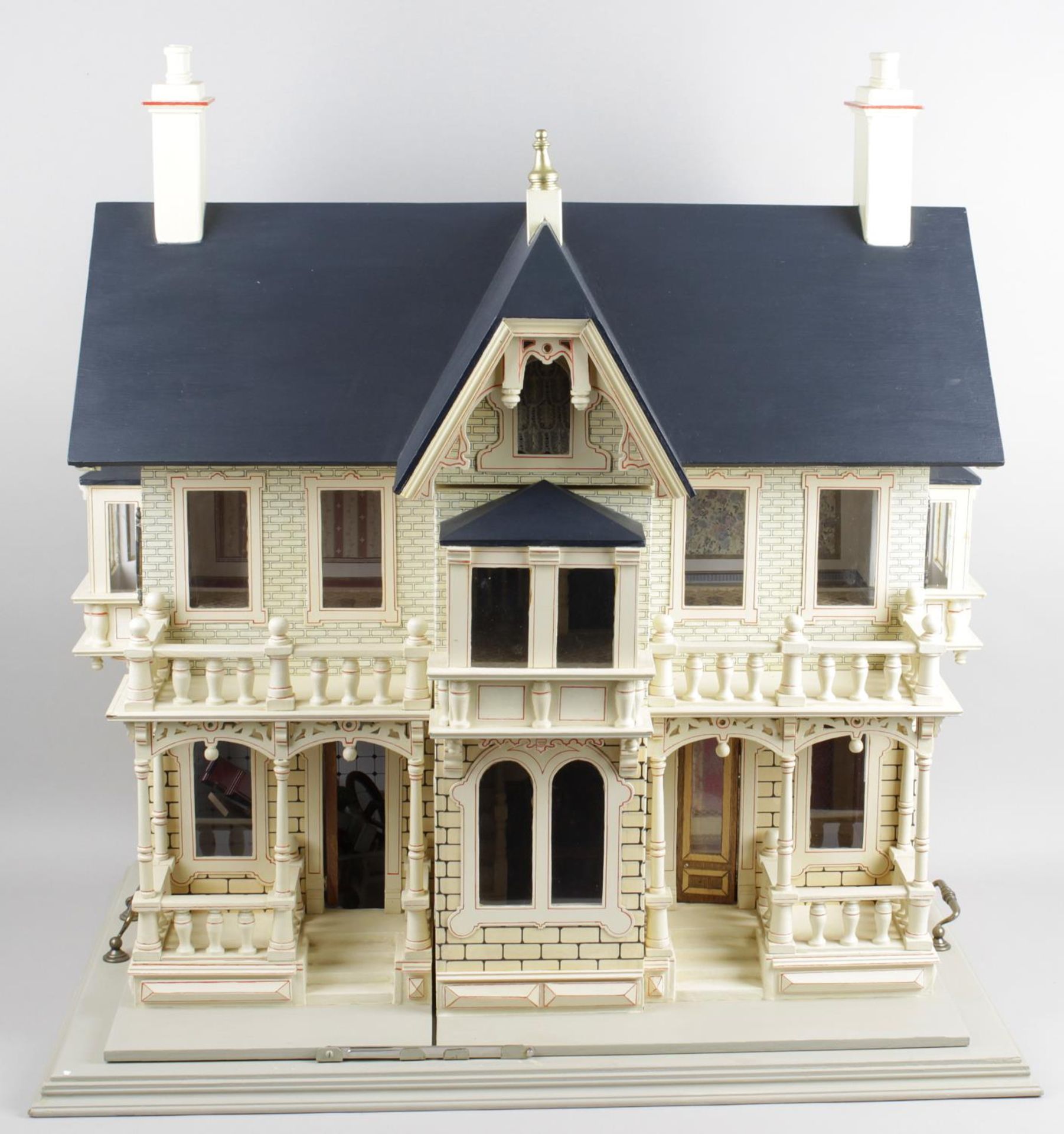 A reproduction wooden dolls house,