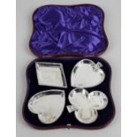 A set of four late Victorian silver dishes,