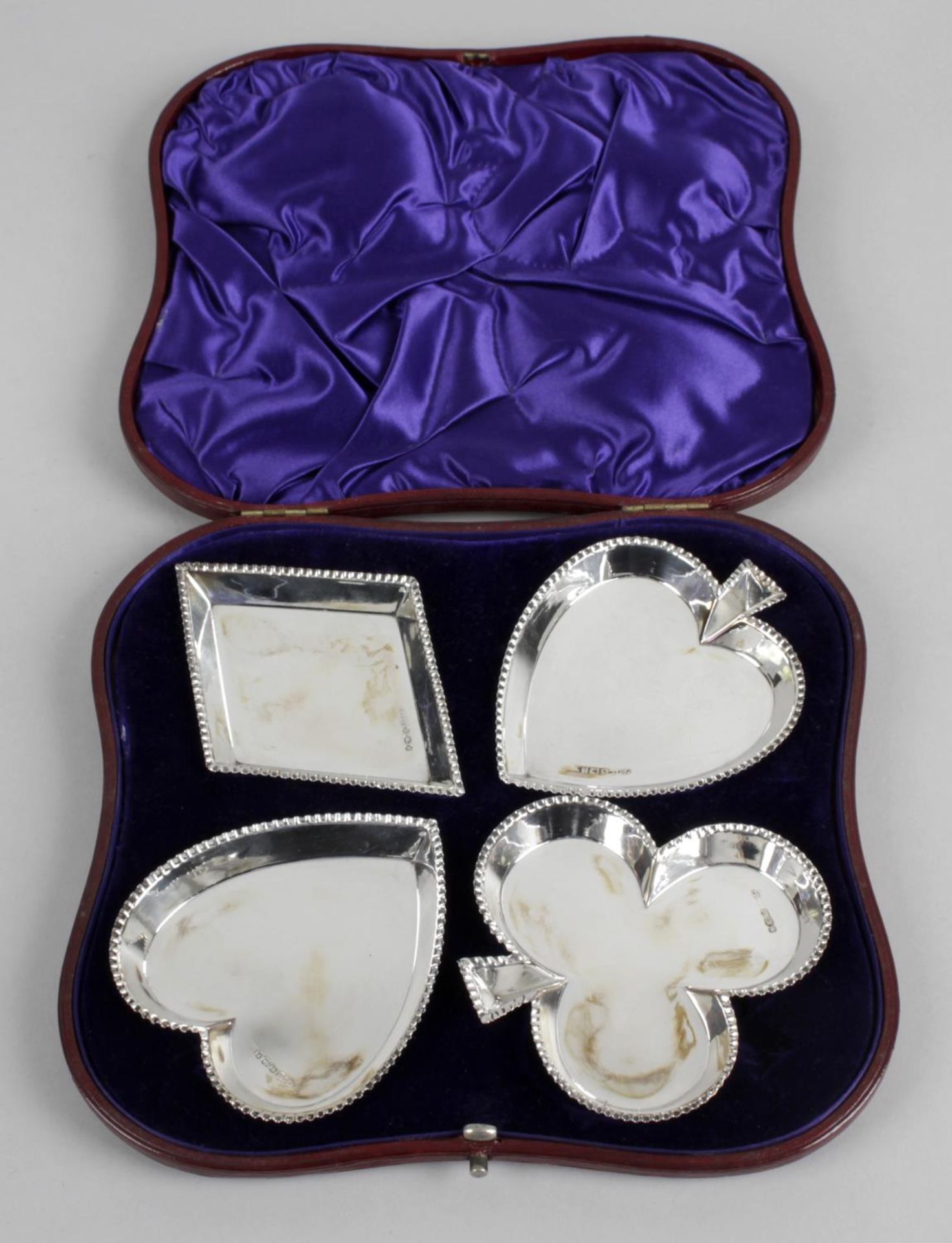 A set of four late Victorian silver dishes,