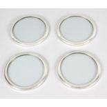 Fifteen modern silver mounted glass coasters,