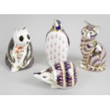 A collection of nine Royal Crown Derby porcelain animal paperweights,