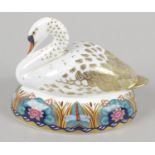 A large Royal Crown Derby paper weight modelled as a swan,