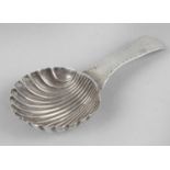 A George III silver caddy spoon,