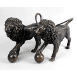 A pair of reproduction Medici bronze lions,