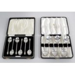 A 1920's cased set of six silver teaspoons with a pair of sugar tongs,