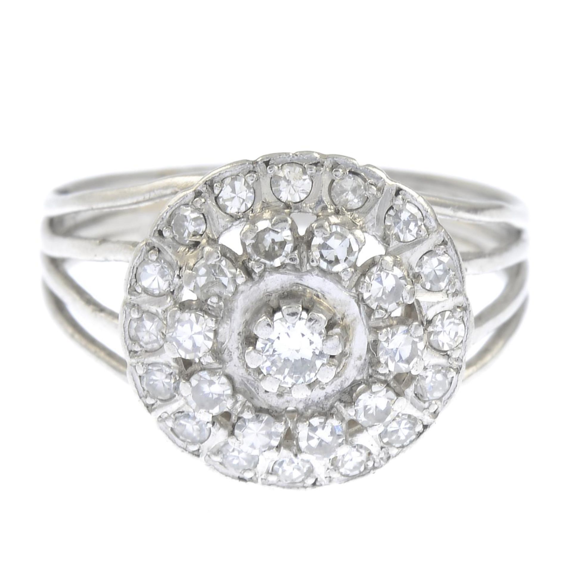 A diamond dress ring.Estimated total diamond weight 0.40ct, H-I colour, SI clarity.Ring size N.
