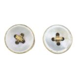 Two early 20th century mother-of-pearl buttons.Diameter 2.1cms.