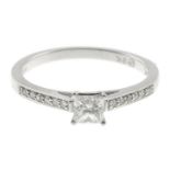 A 9ct gold diamond single-stone ring.Principal diamond weight 0.31ct,