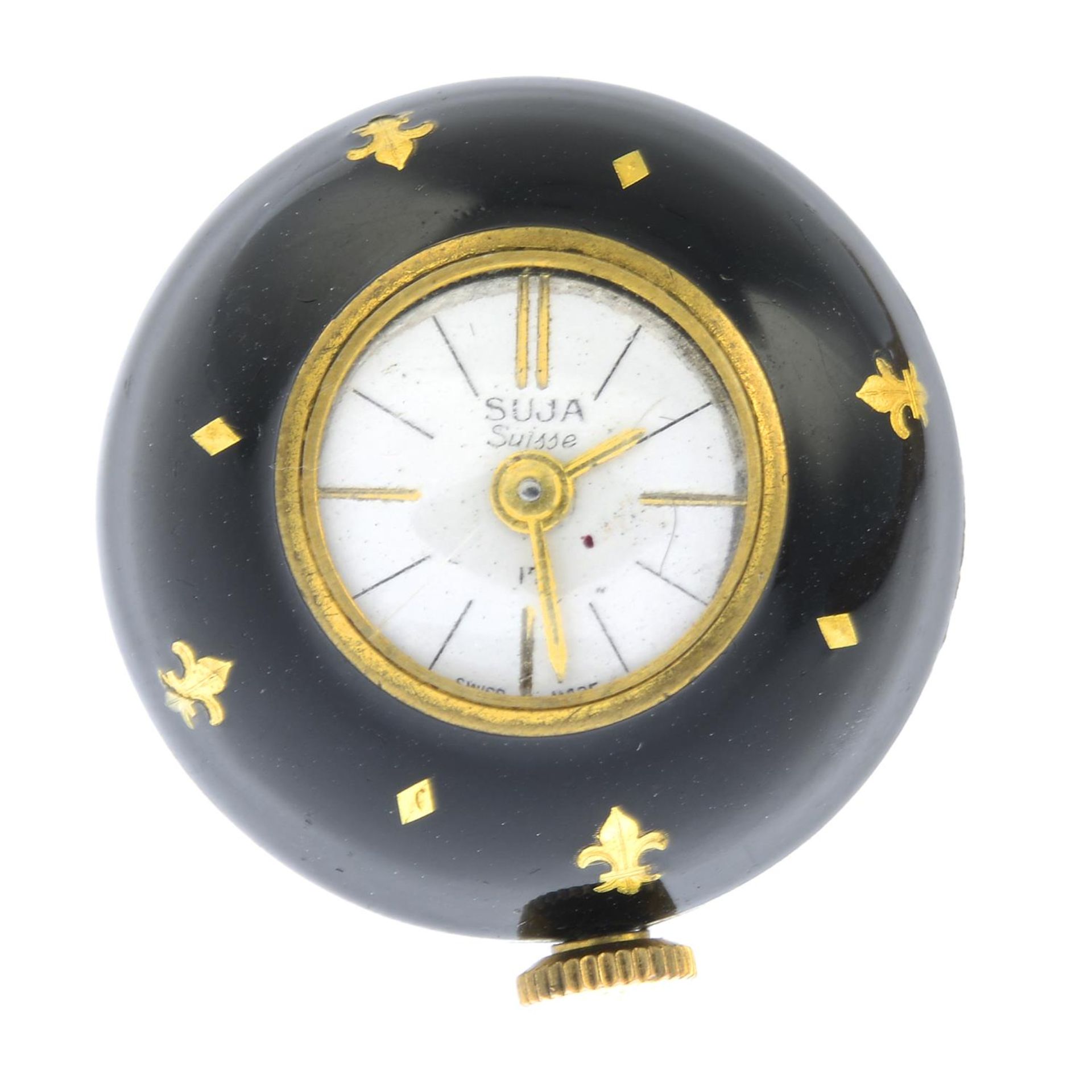 A black enamel and gilt spherical watch pendant.