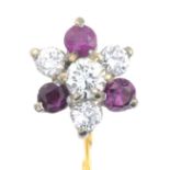 A brilliant-cut diamond and ruby floral cluster stickpin.