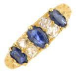 An early 20th century 18ct gold sapphire and diamond ring.Estimated total diamond weight 0.40ct,