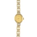 A lady's 9ct gold wristwatch, by Accurist.