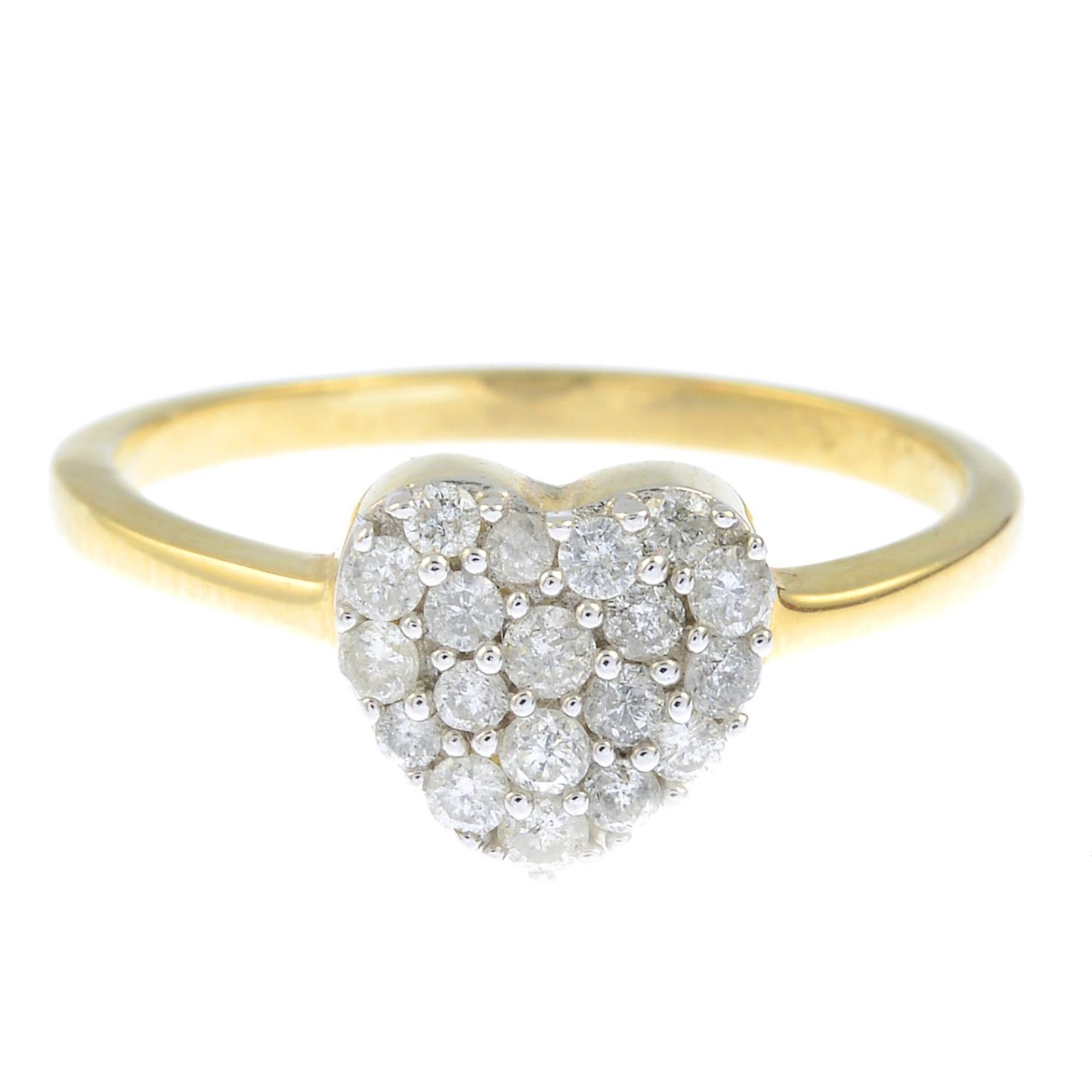 A 9ct gold diamond heart ring.Estimated total diamond weight 0.25ct.