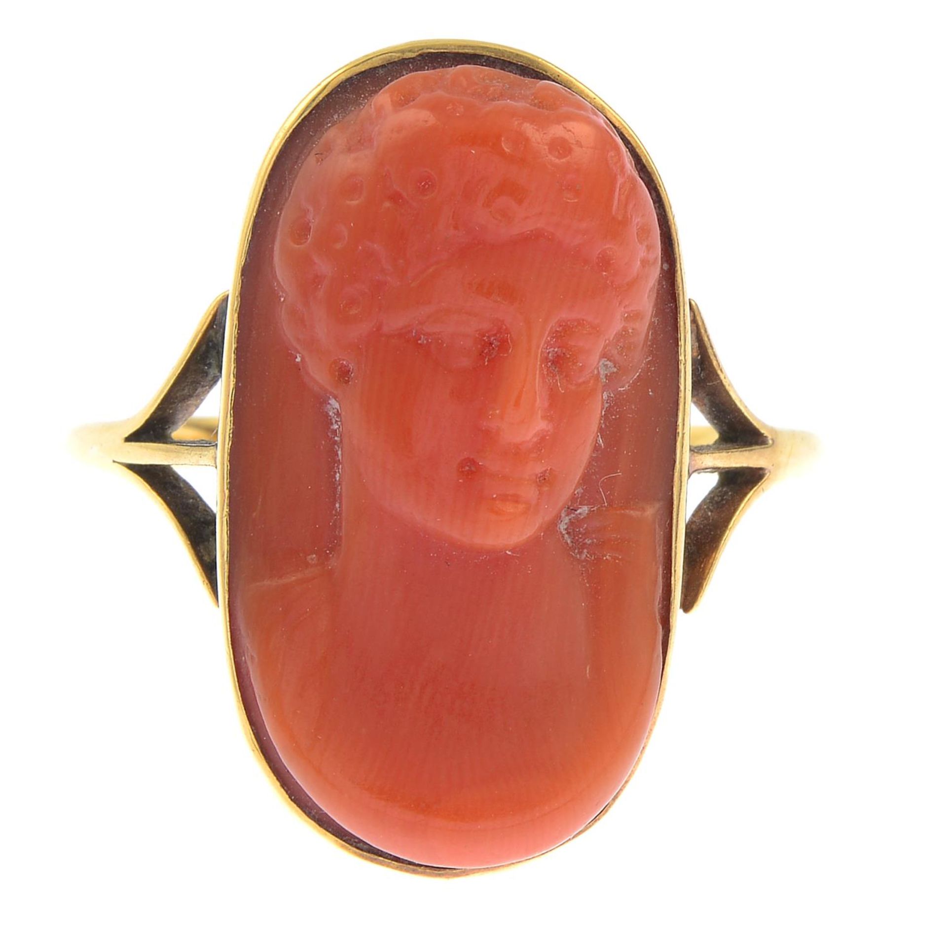 A carved coral ring.Ring size S1/2.