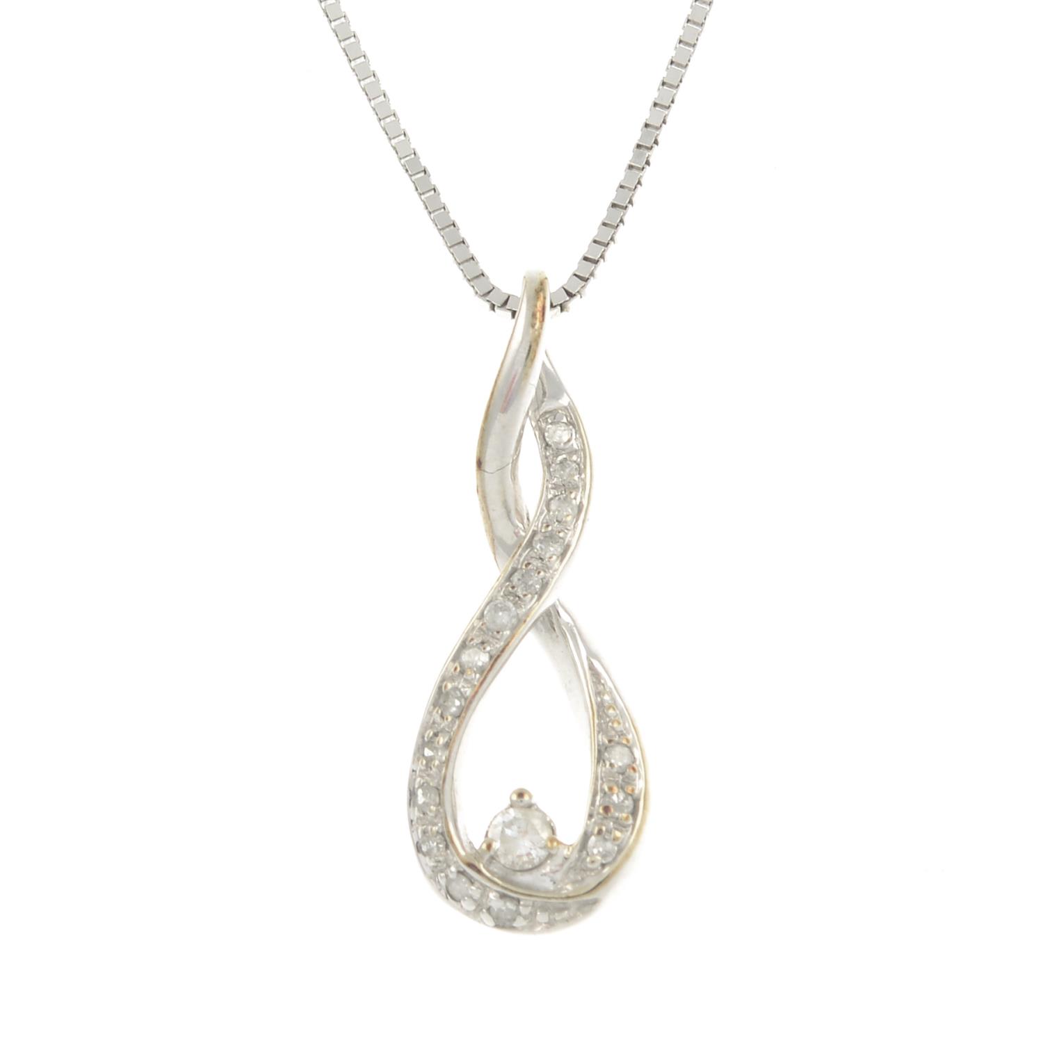 A 9ct gold diamond pendant,