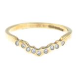 A 9ct gold diamond chevron ring.Estimated total diamond weight 0.10ct.