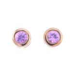 A pair of 9ct gold pink sapphire stud earrings.Hallmarks for 9ct gold.