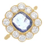A sapphire and cubic zirconia cluster ring.Sapphire calculated weight 1.38cts,