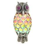 A plique-a-jour enamel owl brooch, with ruby eye detail.