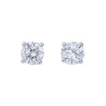 A pair of 9ct gold diamond stud earrings.Estimated total diamond weight 0.30ct,