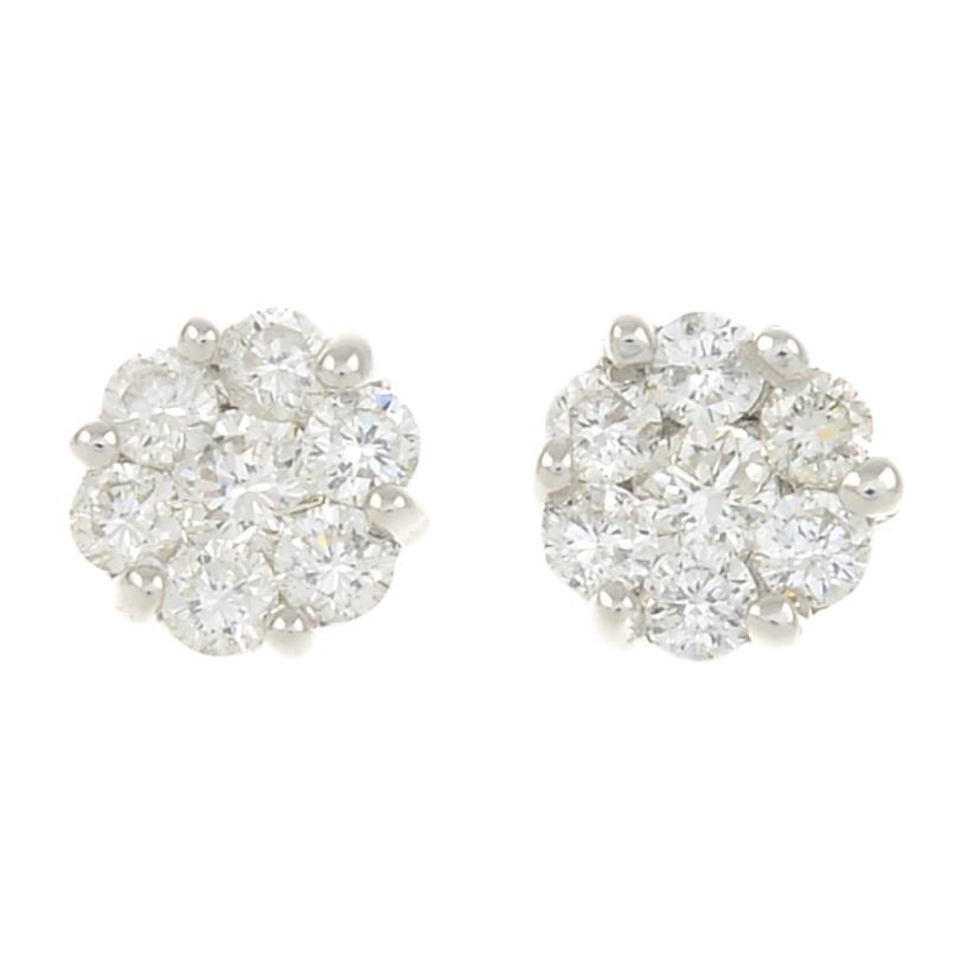 A pair of 18ct gold diamond cluster earrings.Estimated total diamond weight 0.30ct,