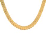 A mid 20th century 18ct gold disc-link necklace.Italian marks.