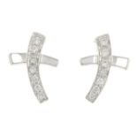 A pair of 18ct gold diamond earrings.Estimated total diamond weight 0.15ct.Hallmarks for London,