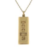 A 9ct gold ingot pendant, with chain.Pendant with hallmarks for 9ct gold, length 5cms, 30gms.