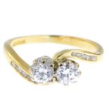 An 18ct gold diamond crossover ring.Estimated total diamond weight 0.60ct,