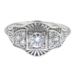 A brilliant-cut diamond dress ring.Principal diamond estimated weight 0.30ct,