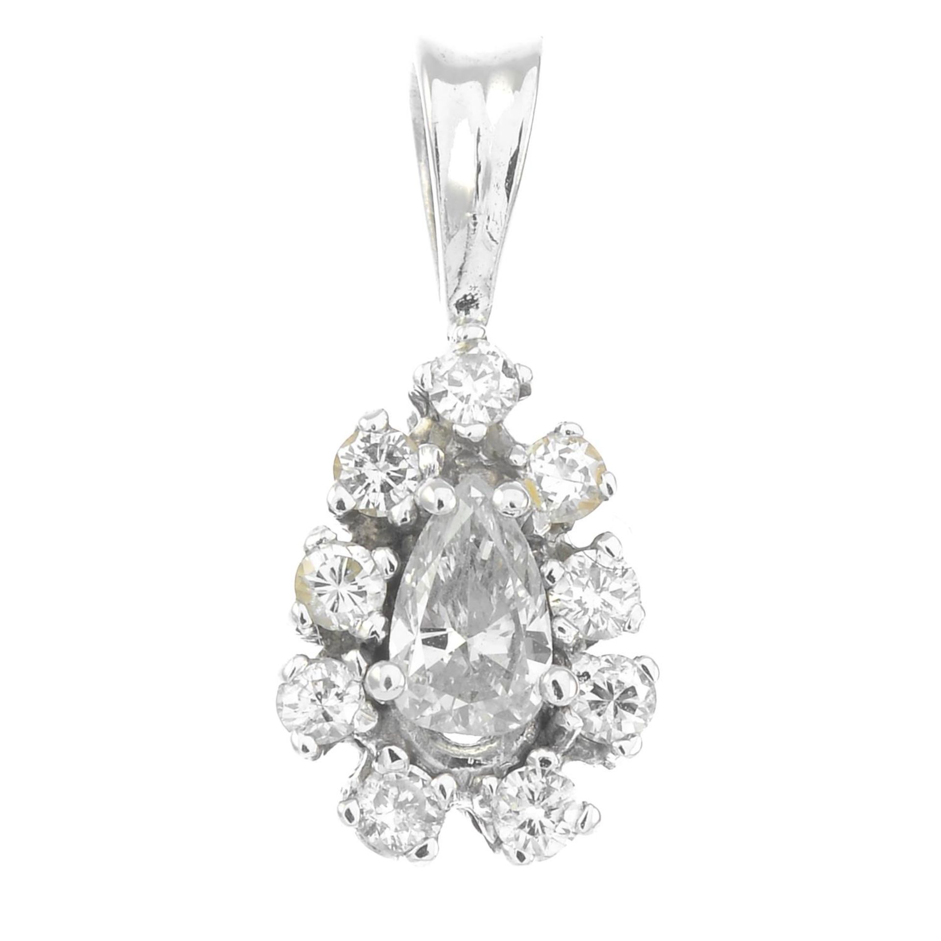 A pear-shape and brilliant-cut diamond cluster pendant.