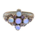 A late 19th century gold gem set ring.Gems to include opal, ruby and amethyst.Ring size N1/2.