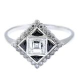 A square-shape diamond and sapphire cluster ring, with single-cut diamond surround.