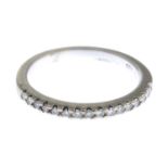 A diamond half eternity ring.Estimated total diamond weight 0.25ct.Stamped 750.Ring size L.