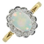 An 18ct gold opal and diamond cluster ring.Estimated total diamond weight 0.20ct.Hallmarks for