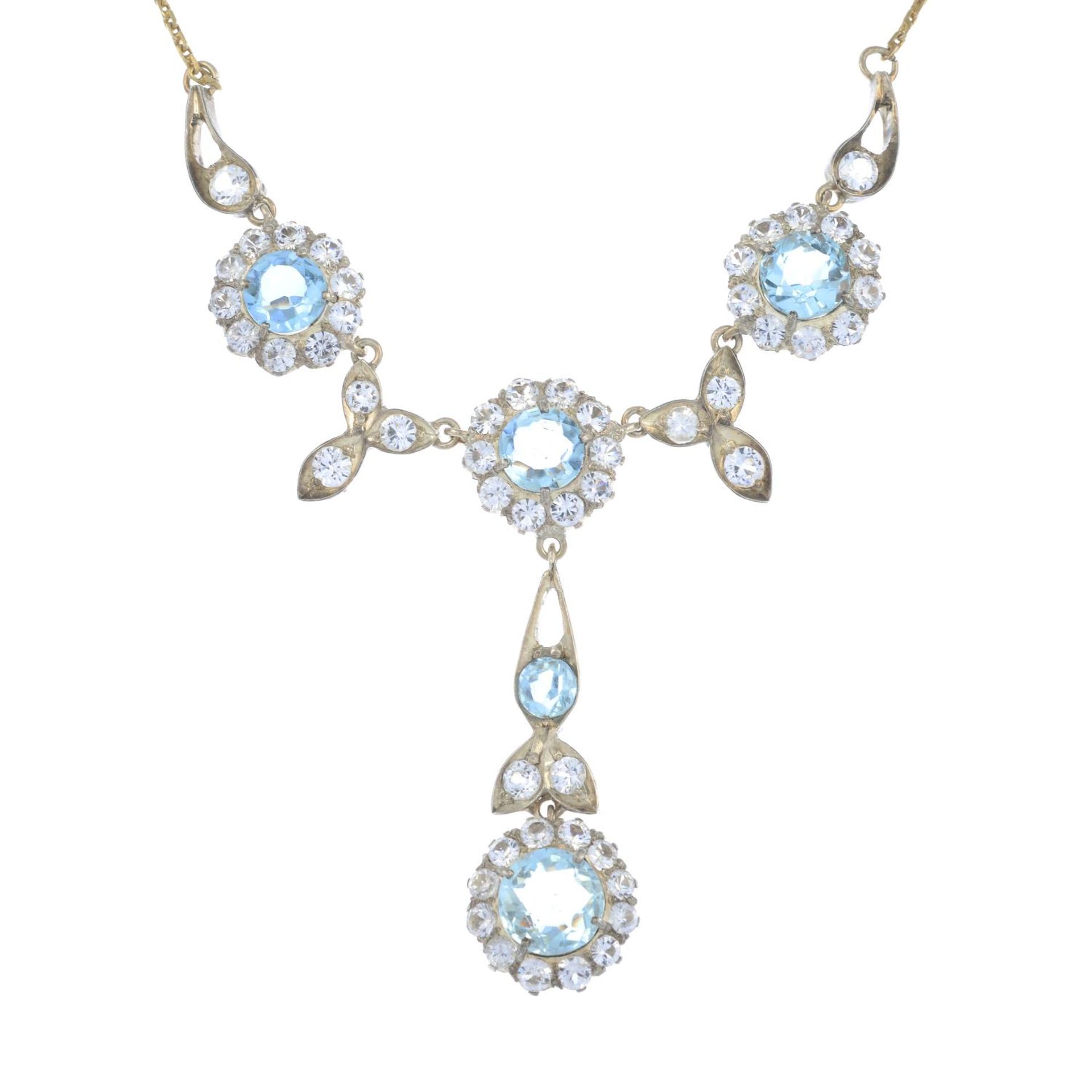 A mid 20th century aquamarine and gem-set necklace.Length 39cms.
